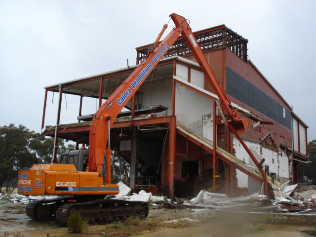 long reach excavator demolishing knackery
