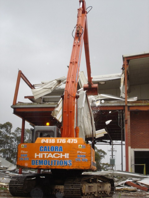 long reach excavator demolishing knackery