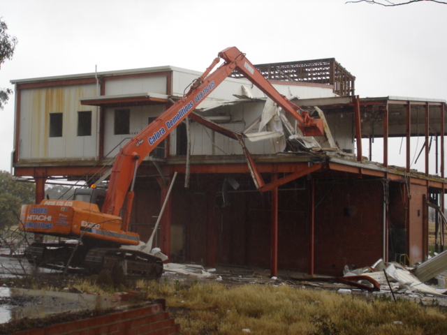 long reach excavator demolishing knackery