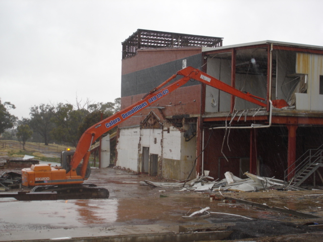 long reach excavator demolishing knackery