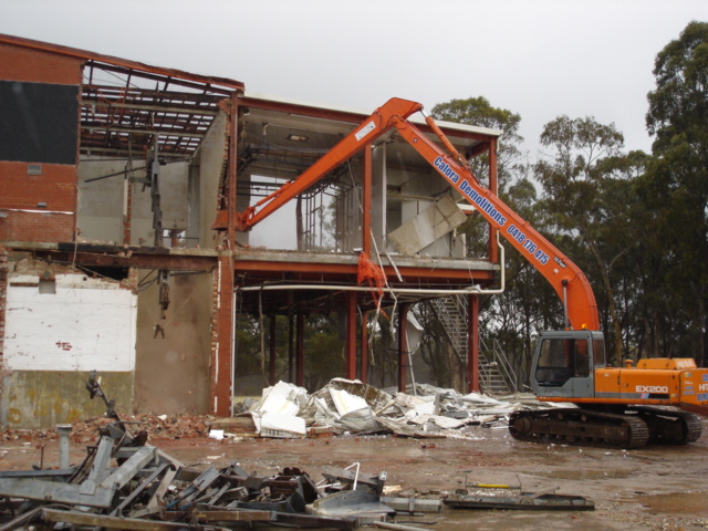 long reach excavator demolishing knackery