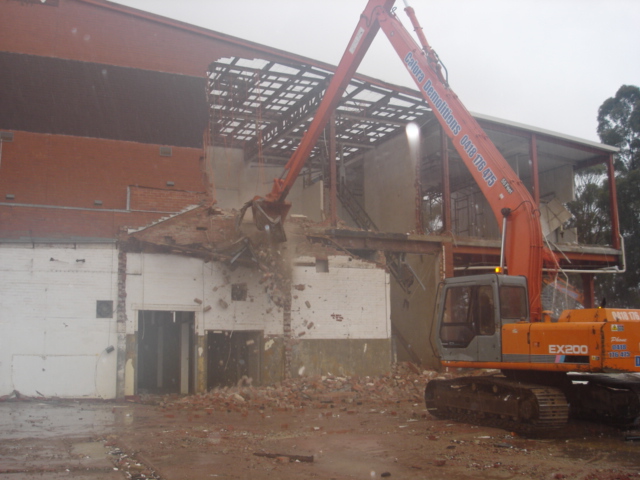 long reach excavator demolishing knackery