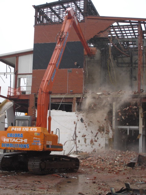 long reach excavator demolishing knackery