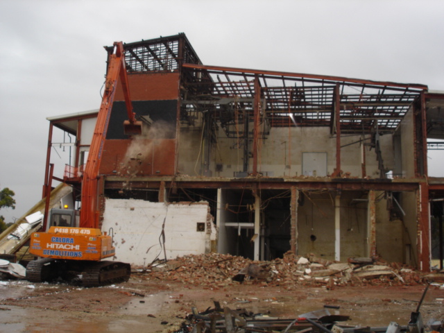 long reach excavator demolishing knackery